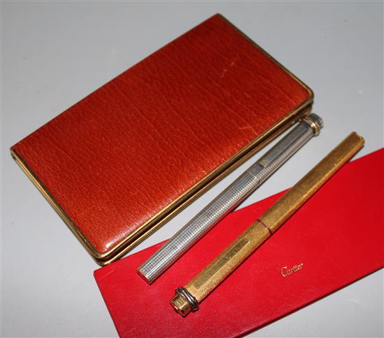 Two Must de Cartier pens and an Orlik of Old Bond Street leather cigarette case